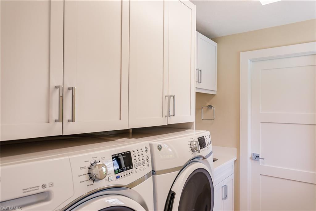 1300 Dolphin Road Naples, FL 34102 - Photo 14 of 22 a utility room with dryer and washer