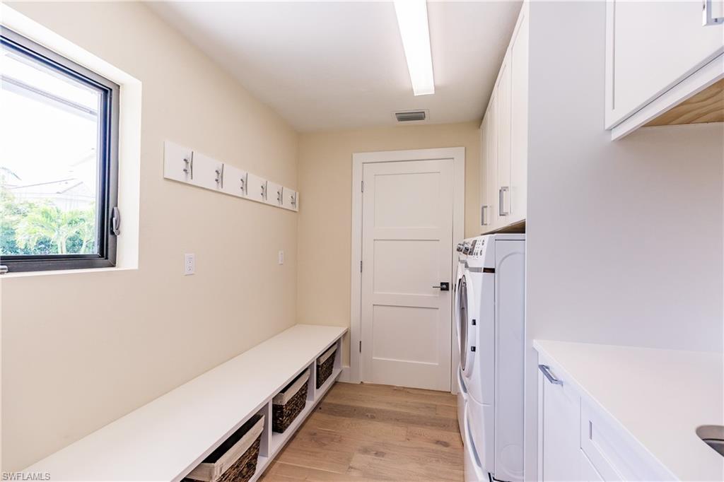 1300 Dolphin Road Naples, FL 34102 - Photo 15 of 22 a view of a hallway with closet