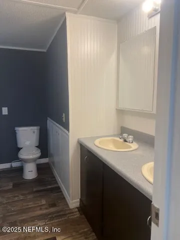 a bathroom with a sink and a toilet