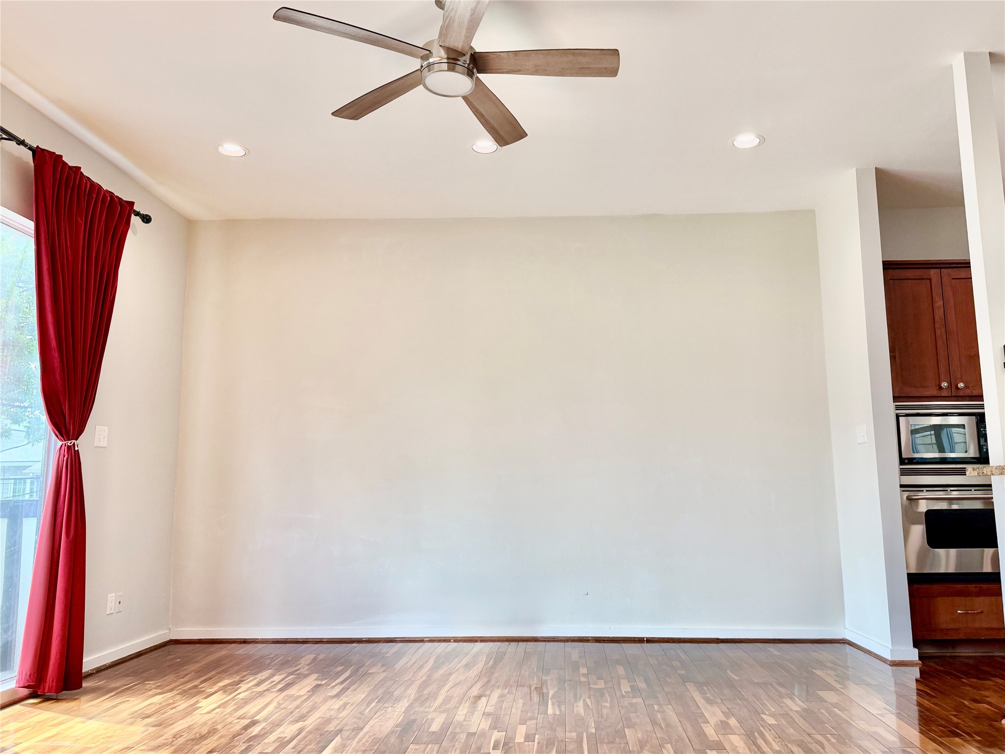 608 West Drew Street, Unit B Houston, TX 77006 - Photo 11 of 42 a view of a room with wooden floor and closet