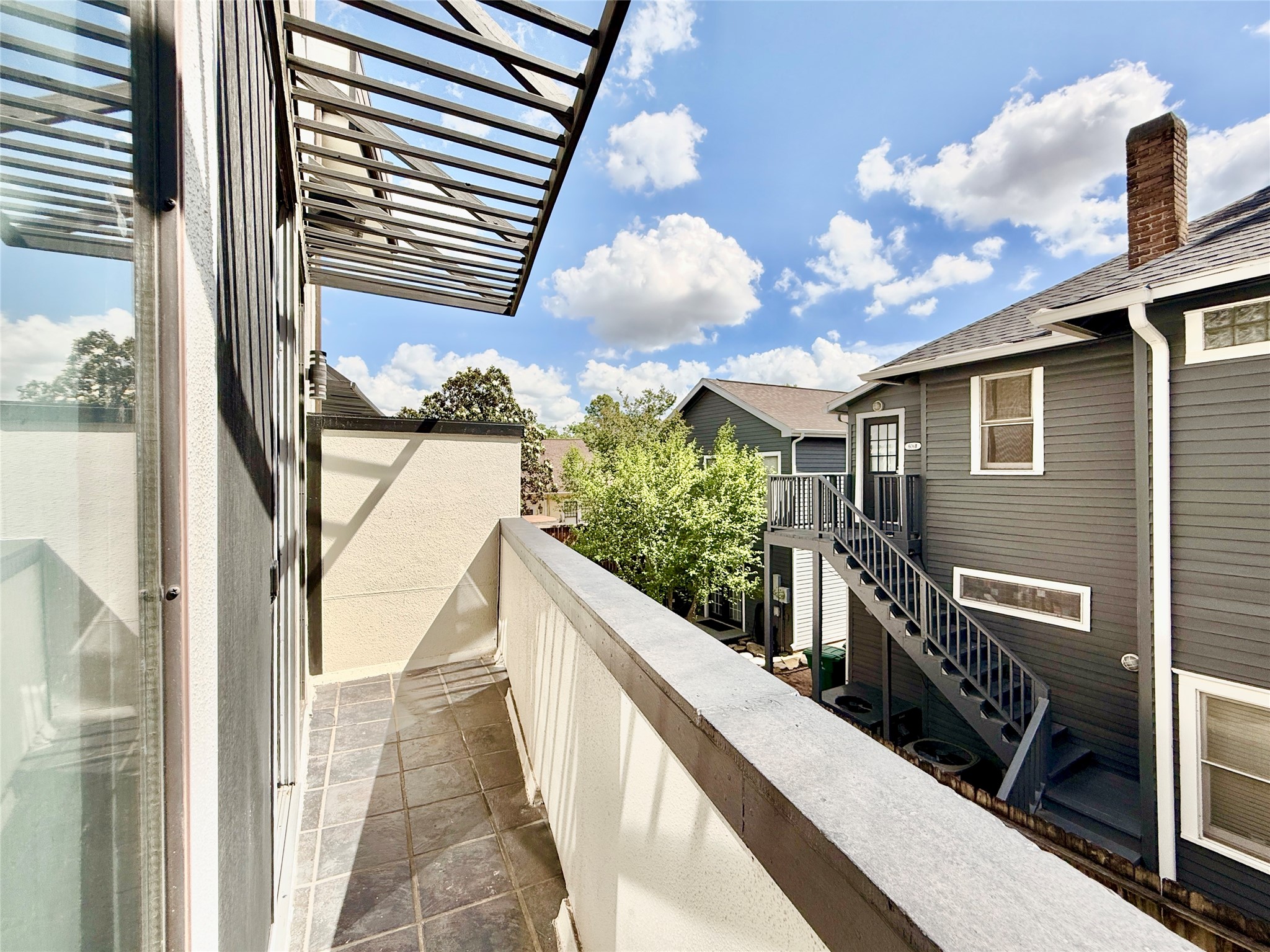 608 West Drew Street, Unit B Houston, TX 77006 - Photo 13 of 42 a view of balcony with wooden floor