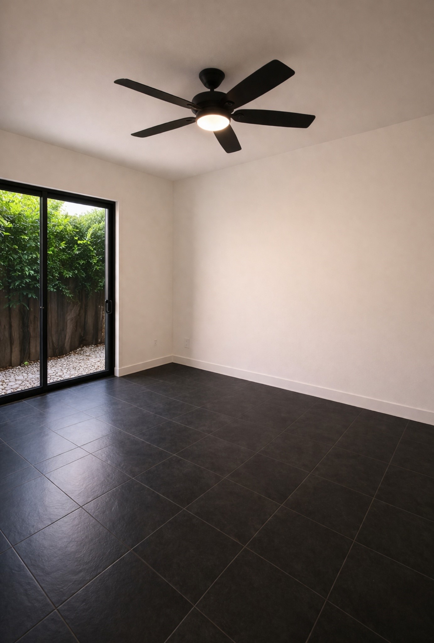 608 West Drew Street, Unit B Houston, TX 77006 - Photo 2 of 42 an empty room with wooden floor and windows