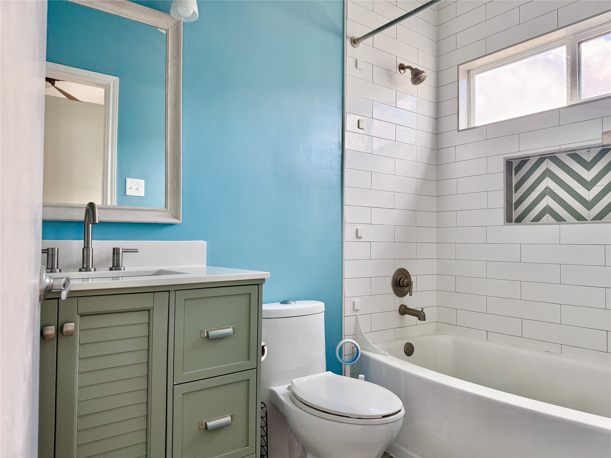 608 West Drew Street, Unit B Houston, TX 77006 - Photo 27 of 42 a bathroom with a sink a toilet and shower