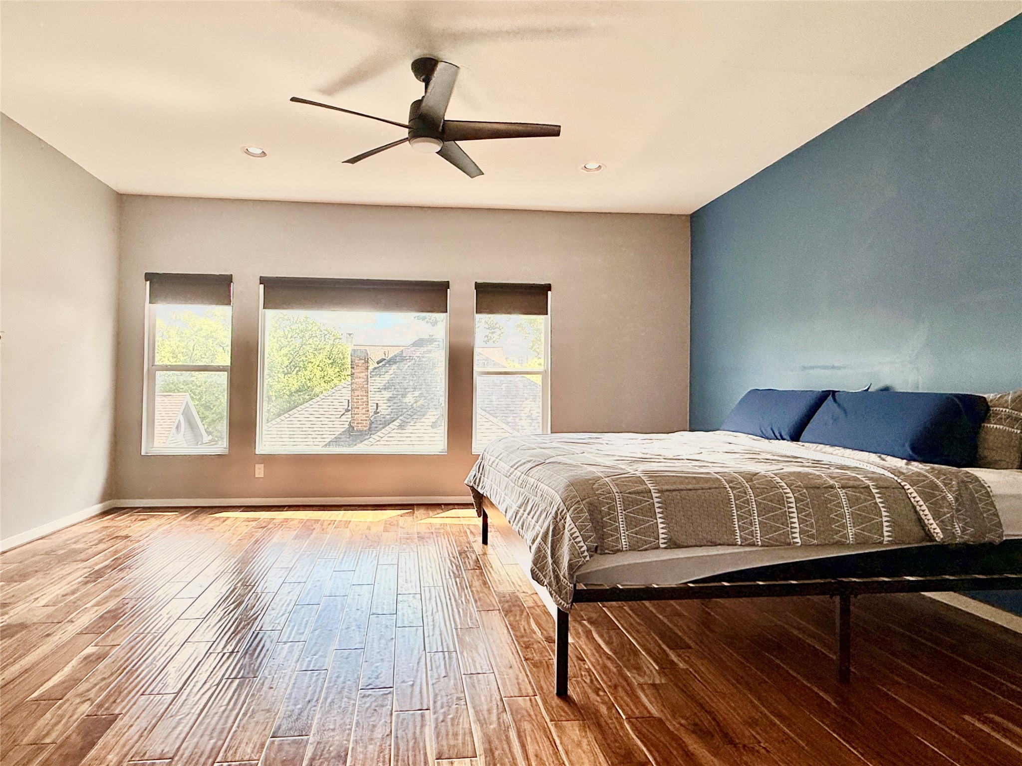 608 West Drew Street, Unit B Houston, TX 77006 - Photo 31 of 42 a bedroom with a bed and a large window