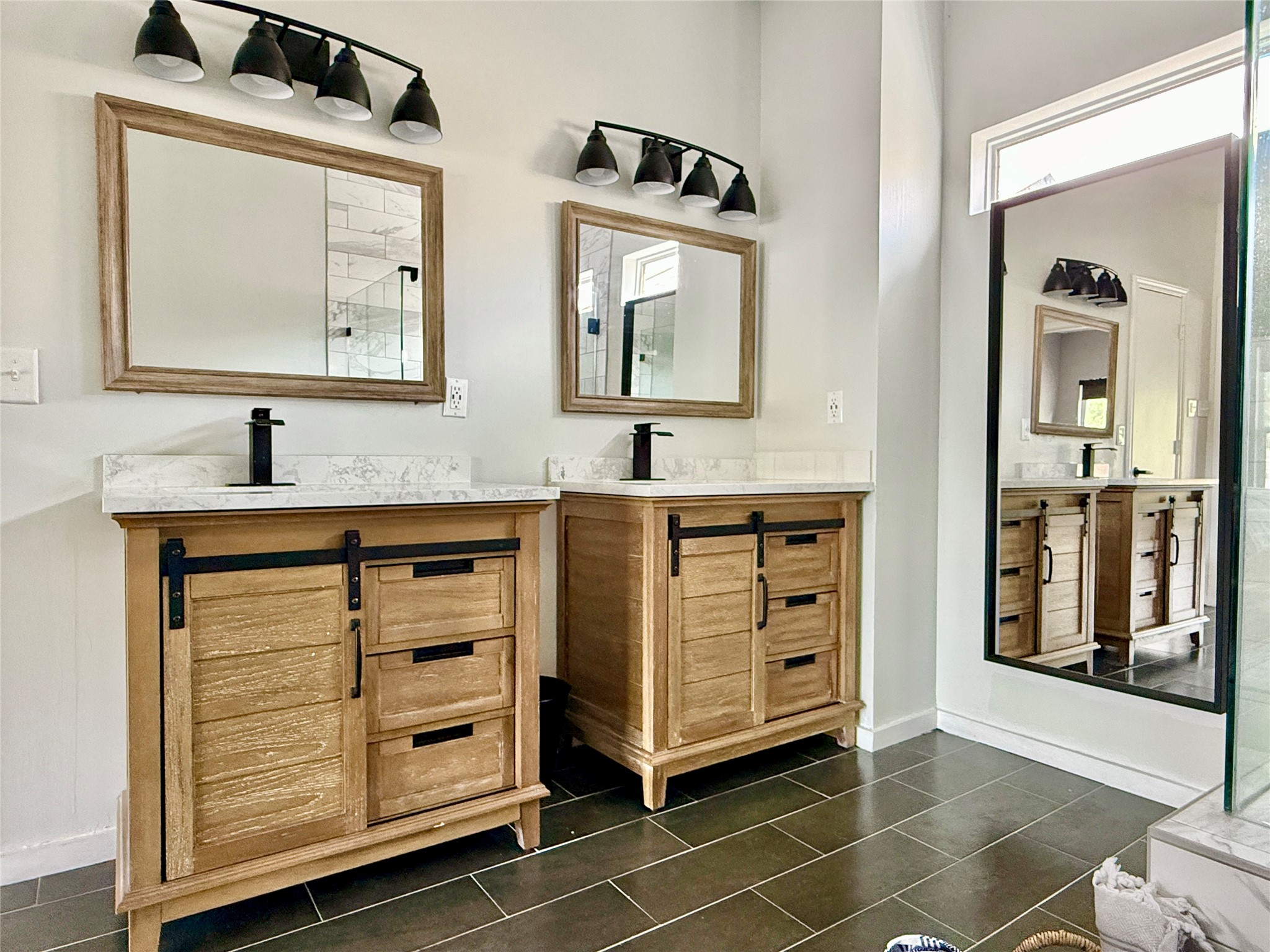 608 West Drew Street, Unit B Houston, TX 77006 - Photo 34 of 42 a bathroom with a sink a vanity and a mirror