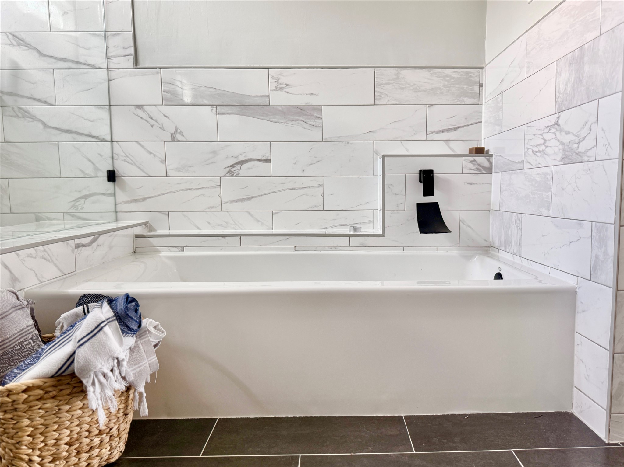 608 West Drew Street, Unit B Houston, TX 77006 - Photo 37 of 42 a bathroom with a bathtub and shower