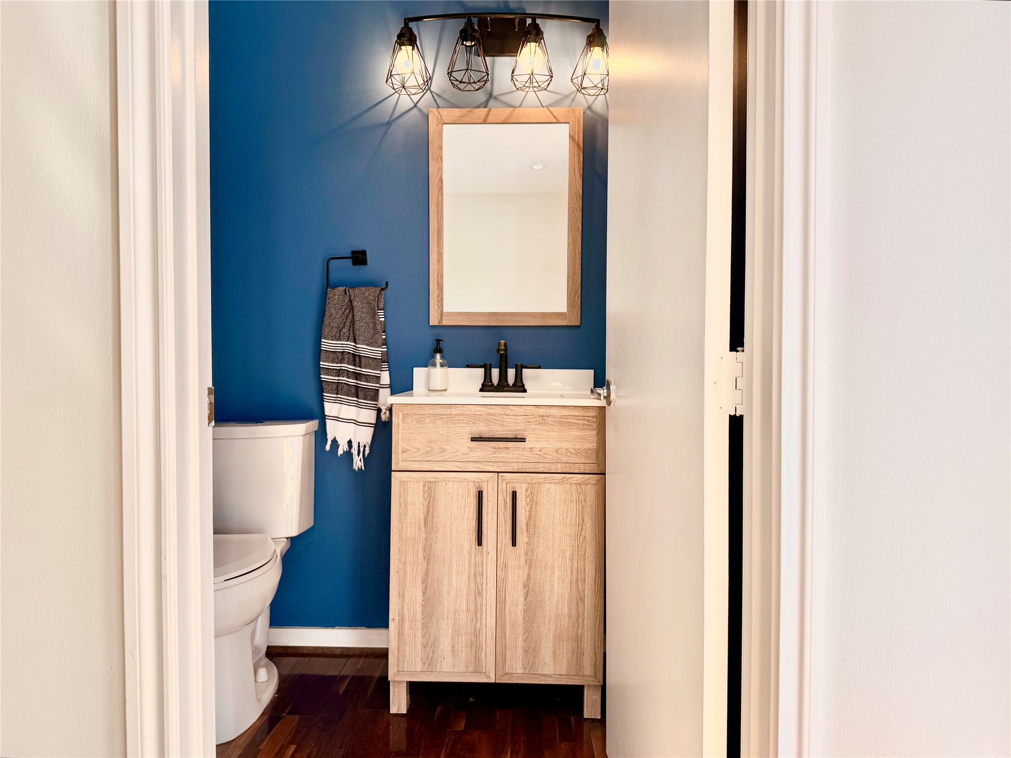 608 West Drew Street, Unit B Houston, TX 77006 - Photo 10 of 42 a bathroom with a sink a mirror and a window