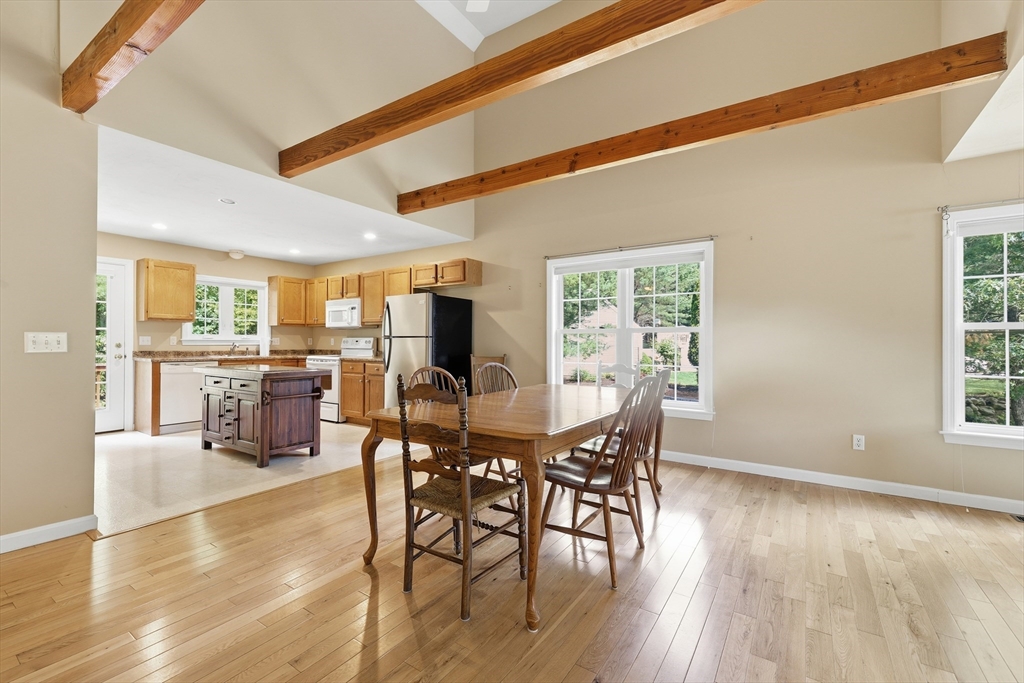 9 Rock Marsh Road, Unit B Wareham, MA 02571 - Photo 13 of 41 a view of a dining room with furniture window and wooden floor