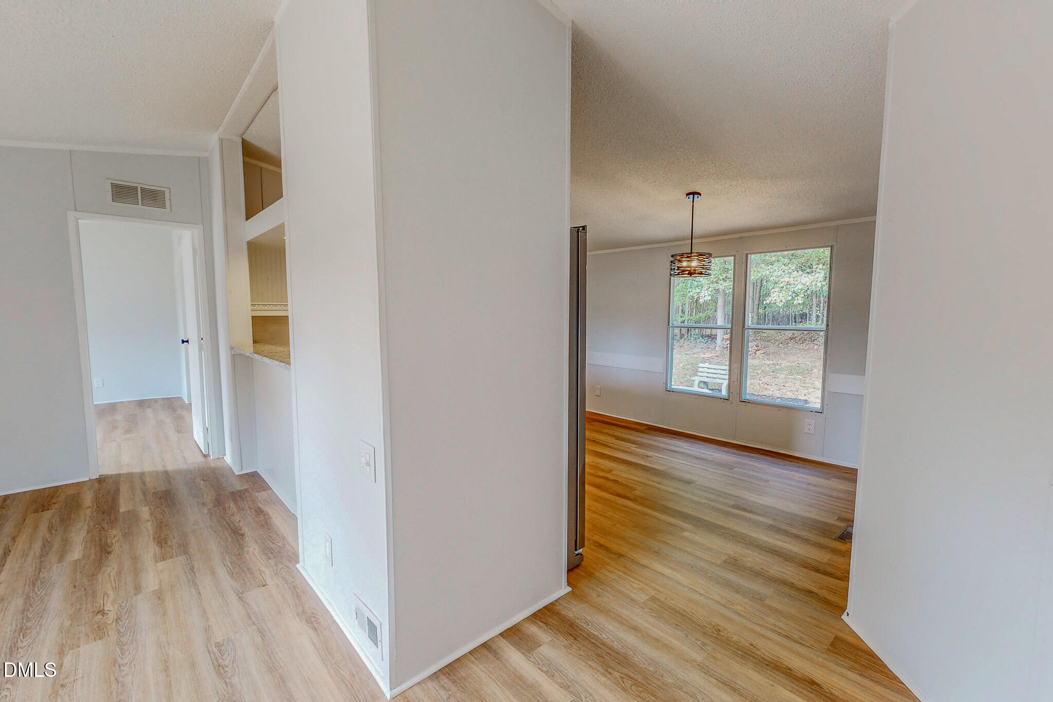 1469 Mollie Mooney Road Roxboro, NC 27574 - Photo 11 of 52 a view of hallway with wooden floor