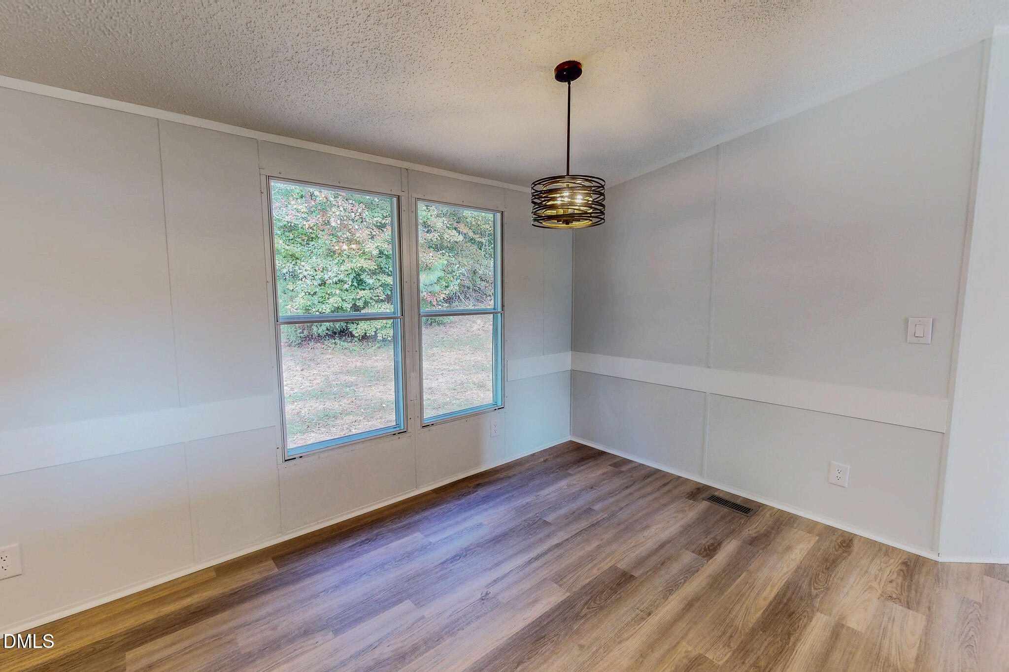 1469 Mollie Mooney Road Roxboro, NC 27574 - Photo 16 of 52 a view of an empty room with a window