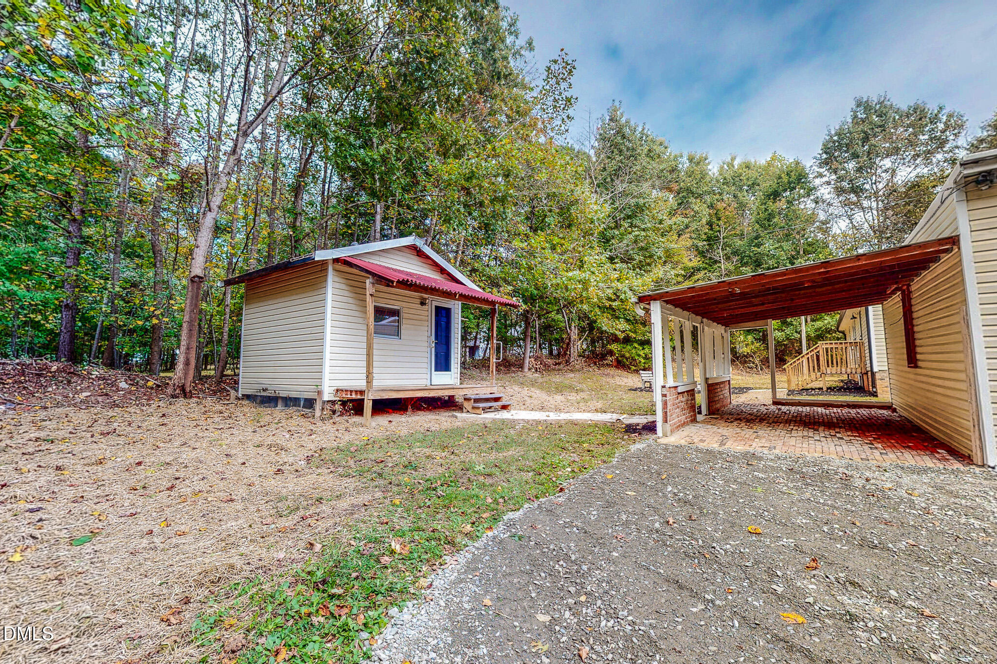 1469 Mollie Mooney Road Roxboro, NC 27574 - Photo 25 of 52 a view of a house with backyard and sitting area