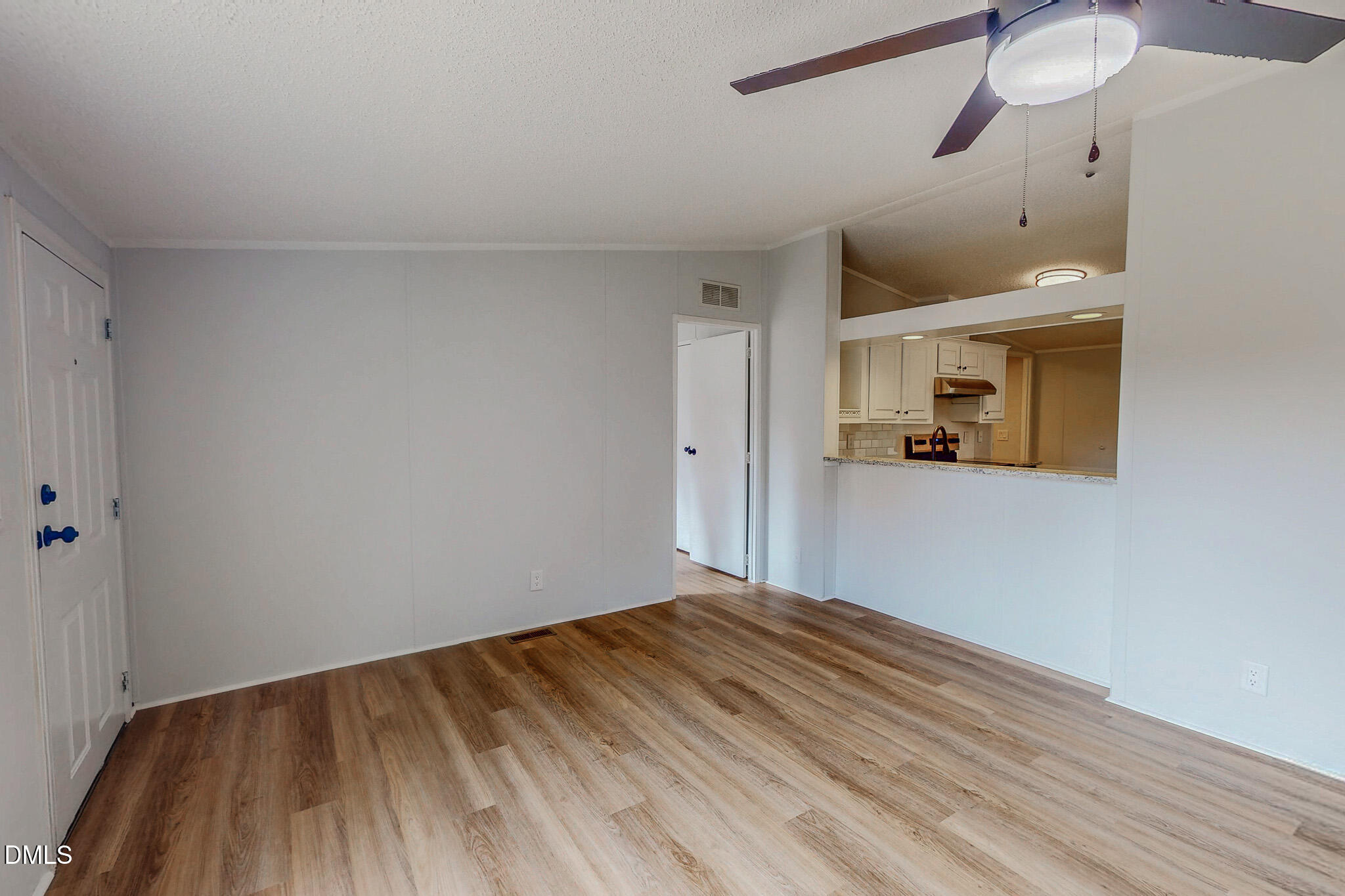 1469 Mollie Mooney Road Roxboro, NC 27574 - Photo 27 of 52 a view of empty room with wooden floor