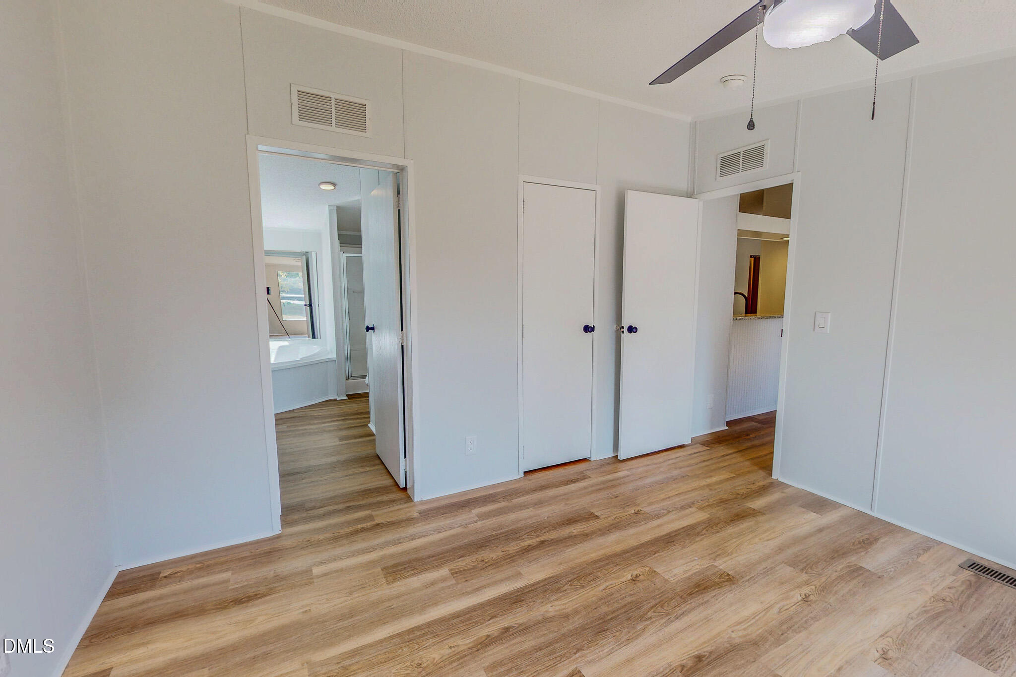 1469 Mollie Mooney Road Roxboro, NC 27574 - Photo 32 of 52 a view of hallway with wooden floor