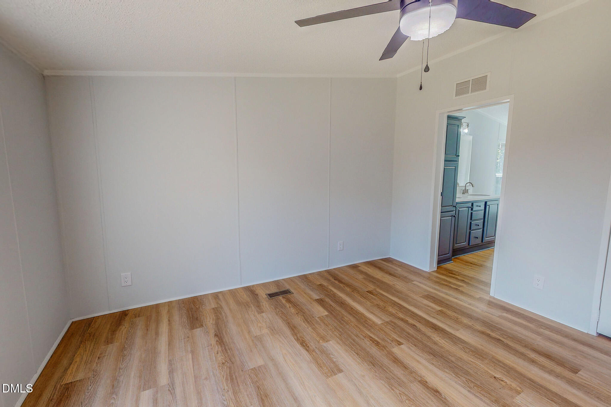 1469 Mollie Mooney Road Roxboro, NC 27574 - Photo 33 of 52 a view of hallway with wooden floor