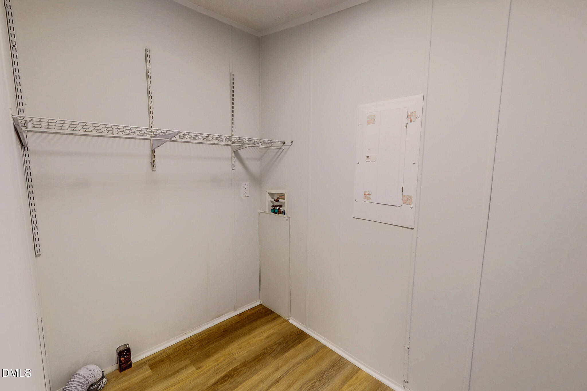 1469 Mollie Mooney Road Roxboro, NC 27574 - Photo 45 of 52 a view of a room with wooden floor