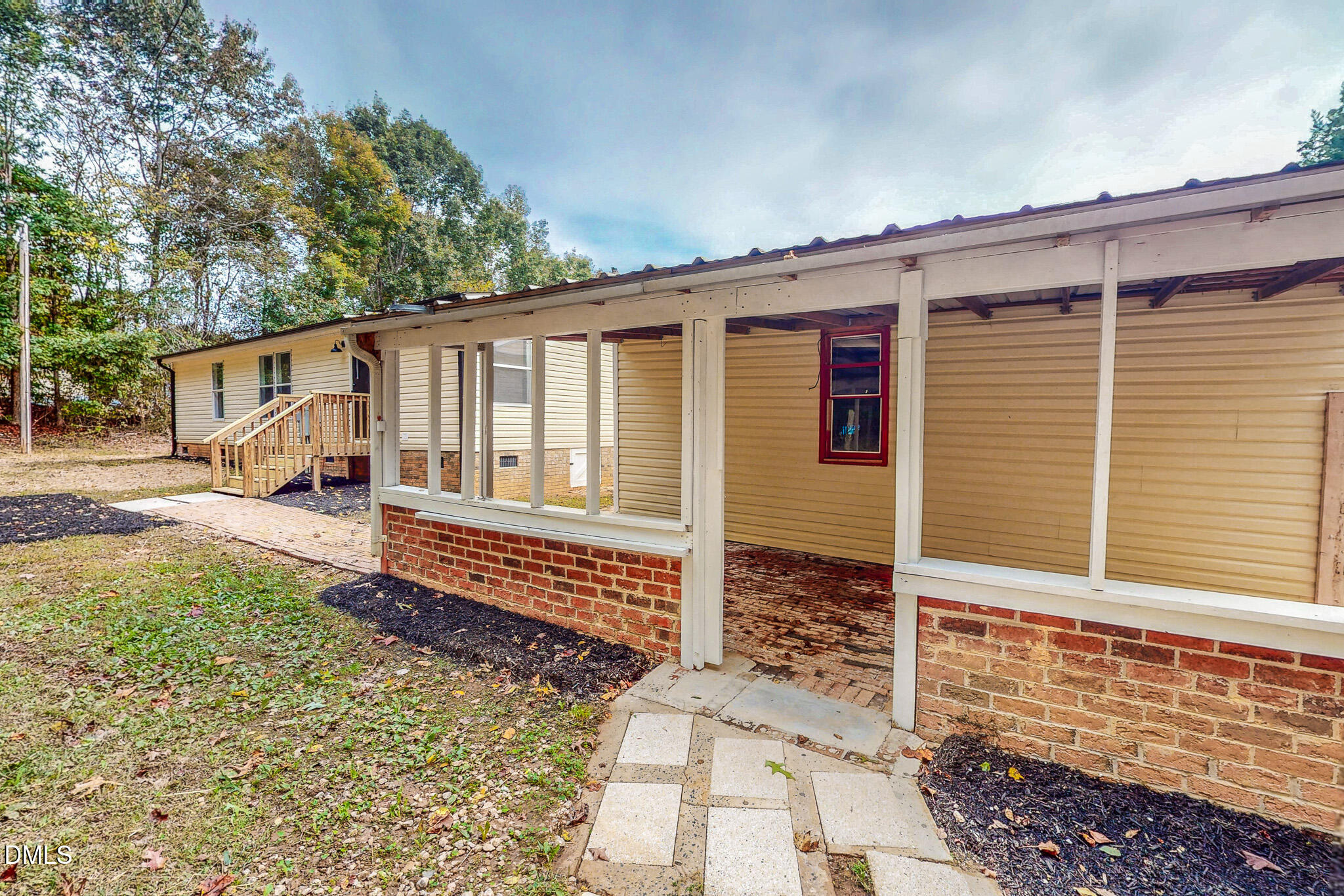 1469 Mollie Mooney Road Roxboro, NC 27574 - Photo 48 of 52 a front view of a house with a yard