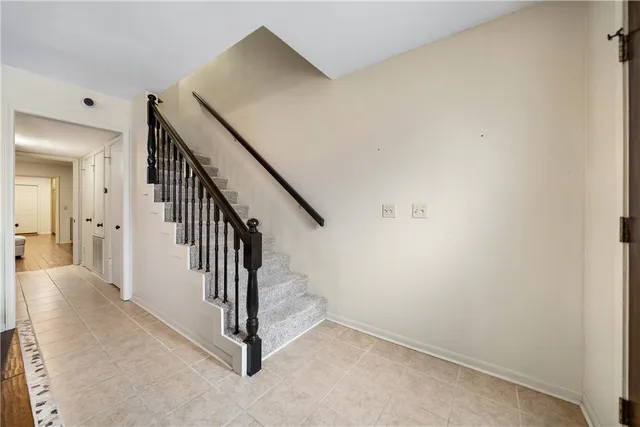 a view of a hallway with staircase