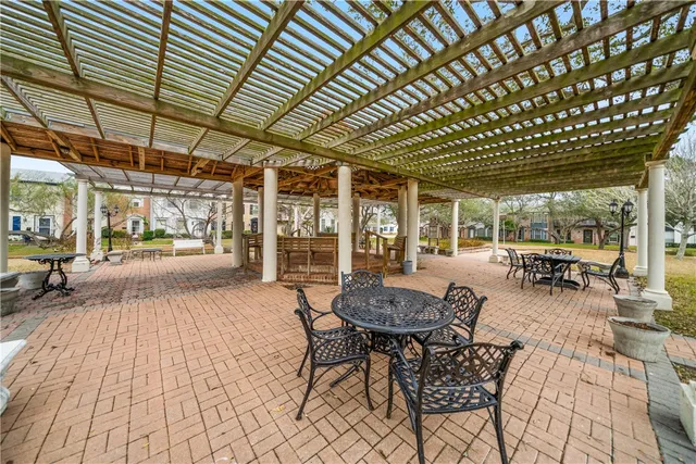 a outdoor space with lots of tables and chairs