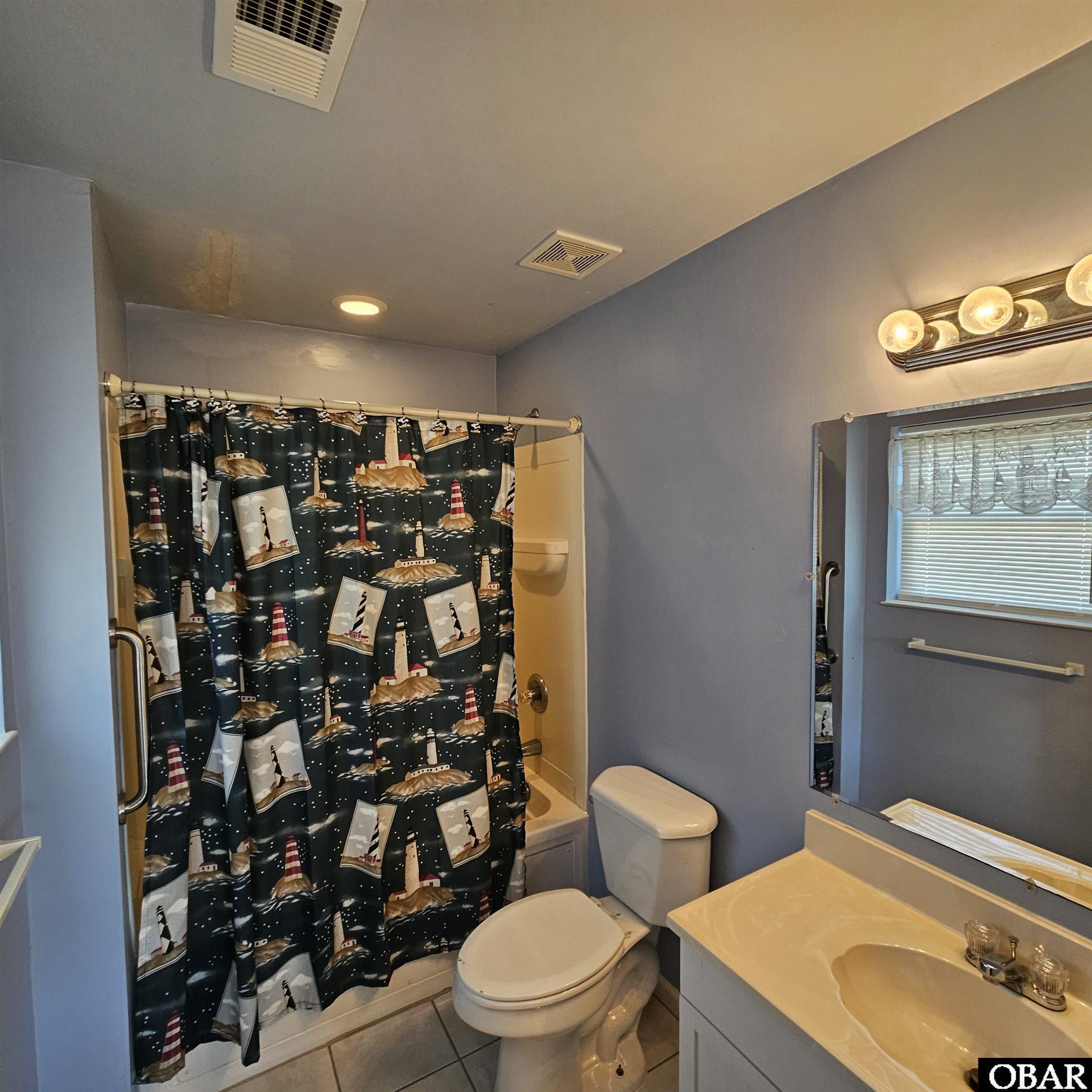 527 Swan Road Corolla, NC 27927 - Photo 23 of 50 upper level ensuite 1 full bath