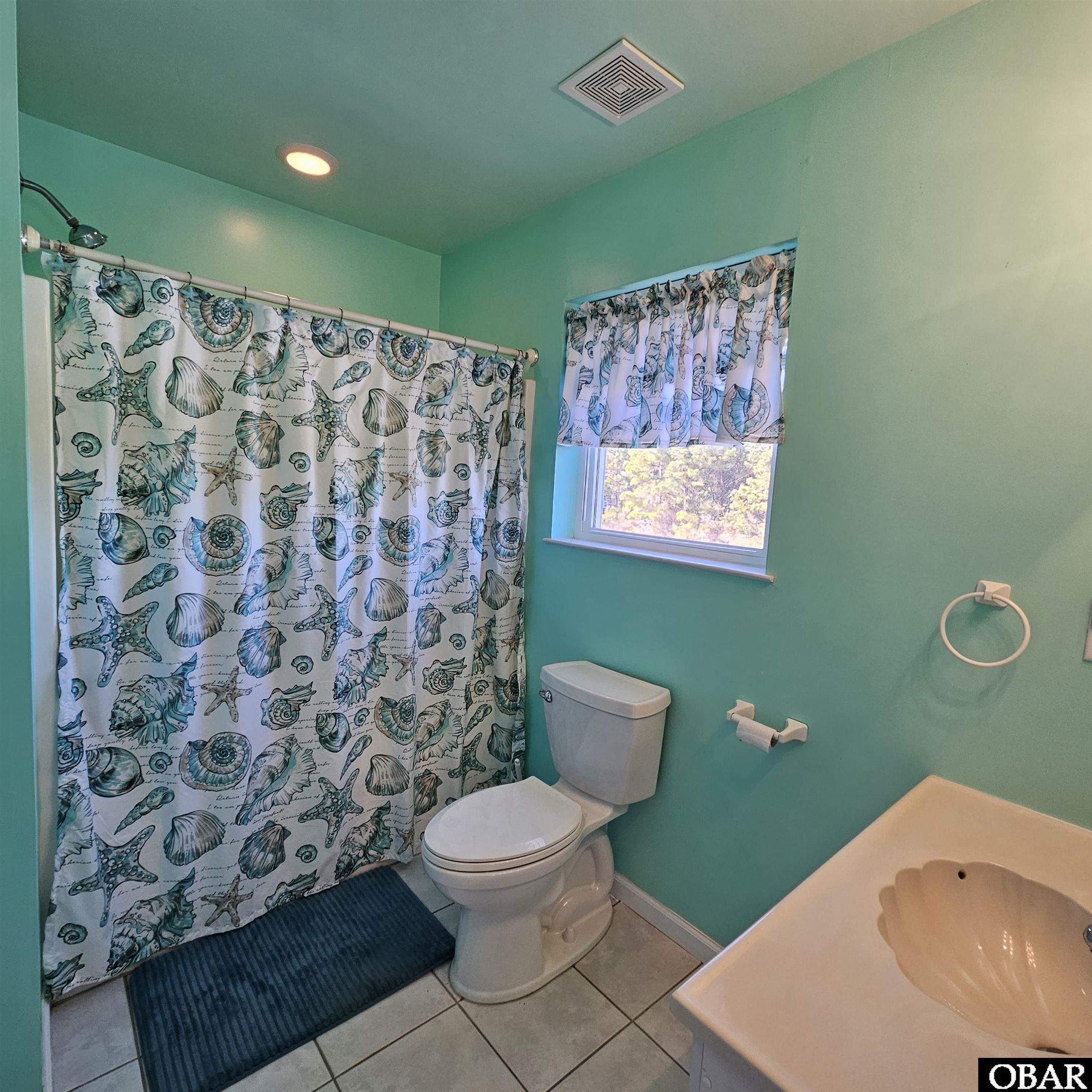 527 Swan Road Corolla, NC 27927 - Photo 34 of 50 ensuite 2 level 2