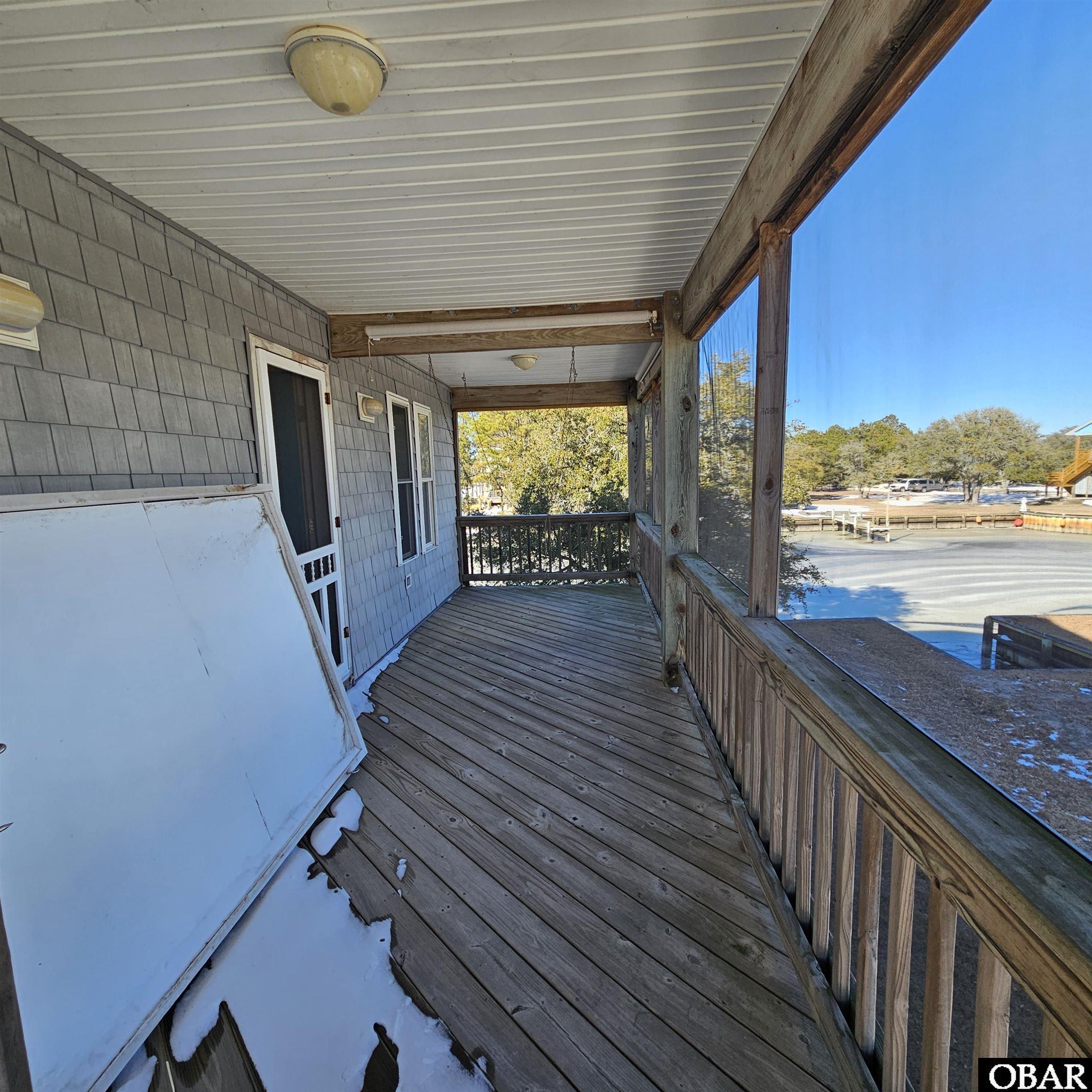 527 Swan Road Corolla, NC 27927 - Photo 39 of 50 level 2 screened porch