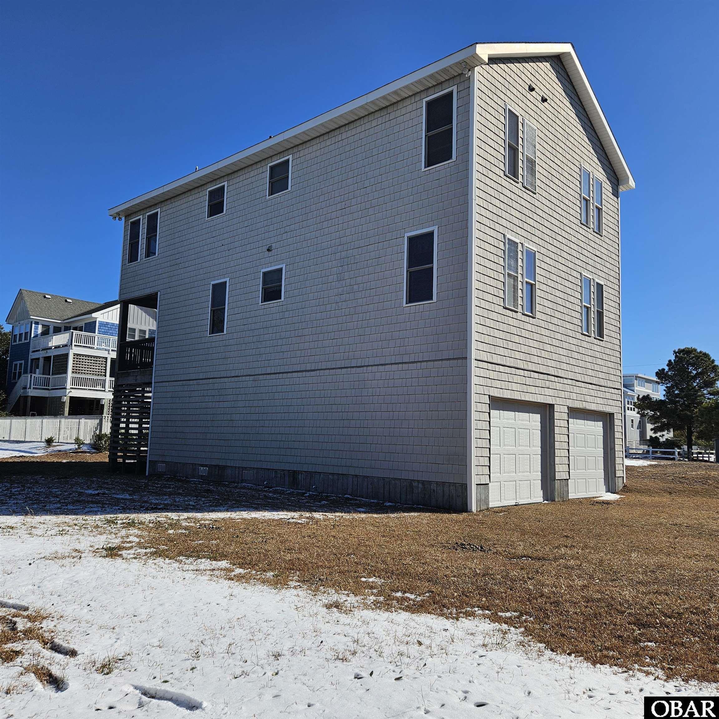 527 Swan Road Corolla, NC 27927 - Photo 4 of 50 north west side