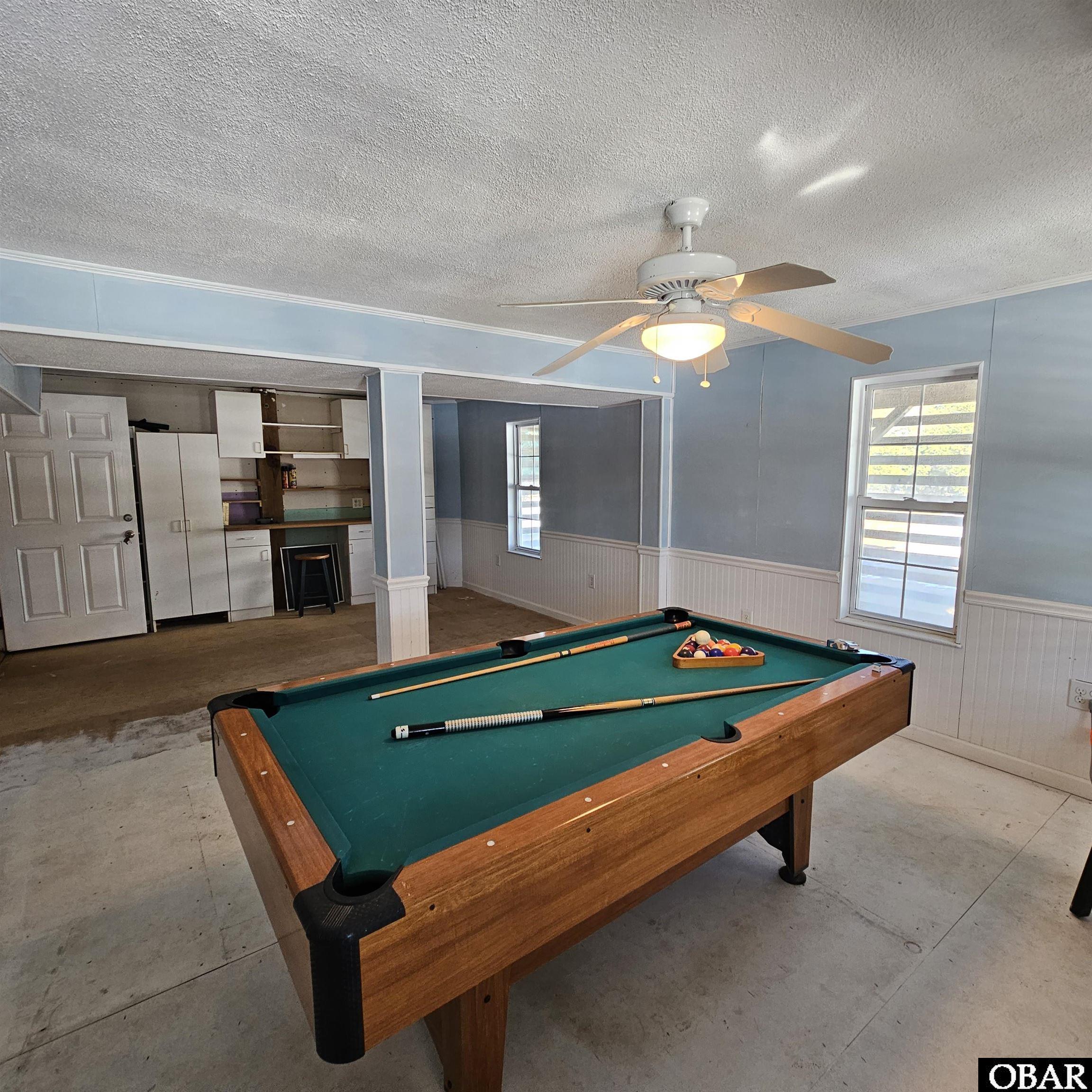527 Swan Road Corolla, NC 27927 - Photo 45 of 50 ground floor game room