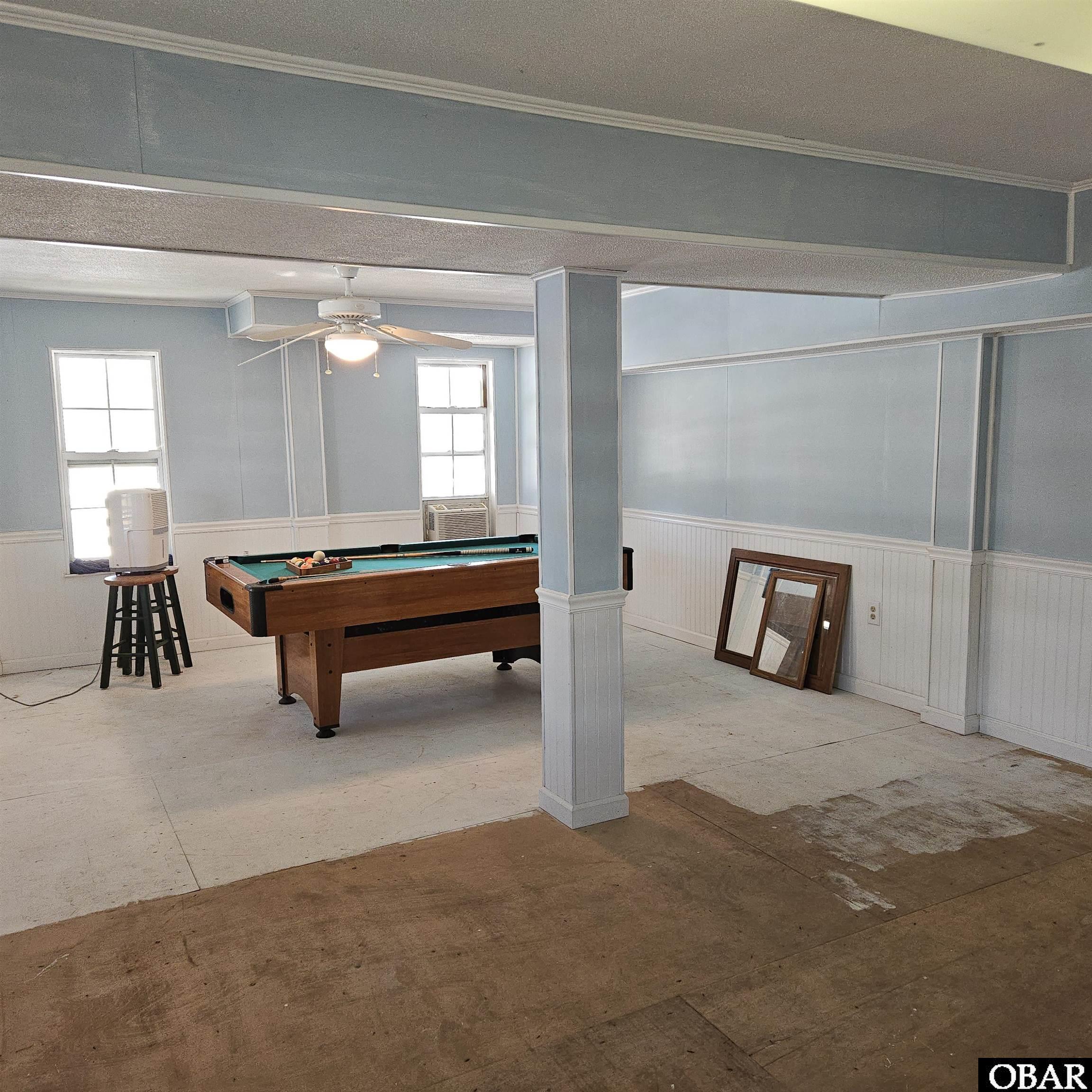 527 Swan Road Corolla, NC 27927 - Photo 46 of 50 ground floor game room