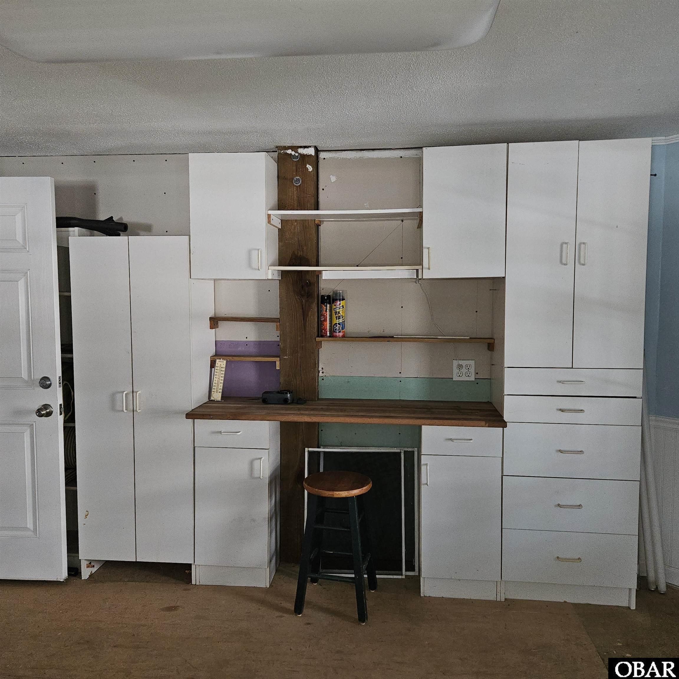 527 Swan Road Corolla, NC 27927 - Photo 49 of 50 game room work bench