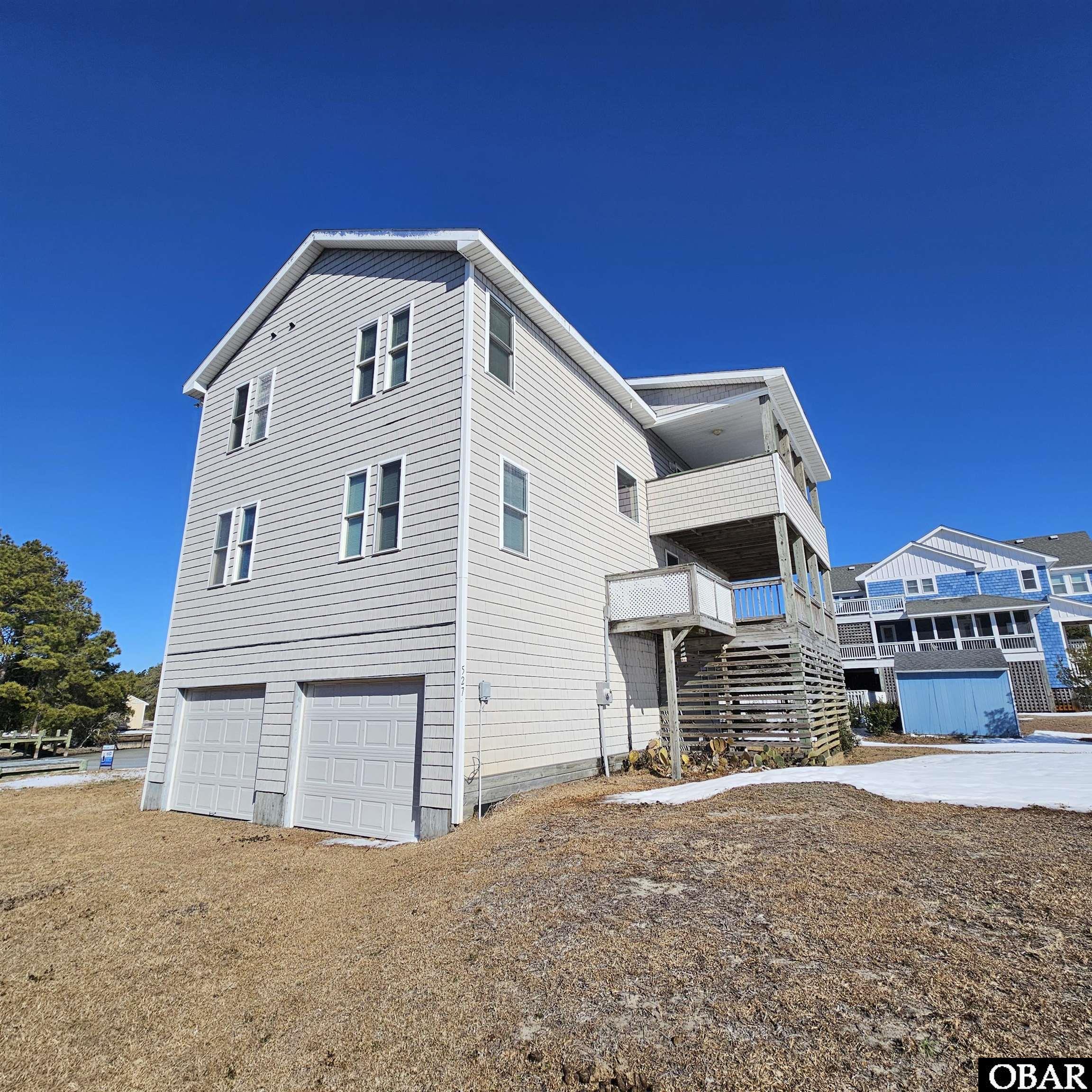 527 Swan Road Corolla, NC 27927 - Photo 5 of 50 South west side