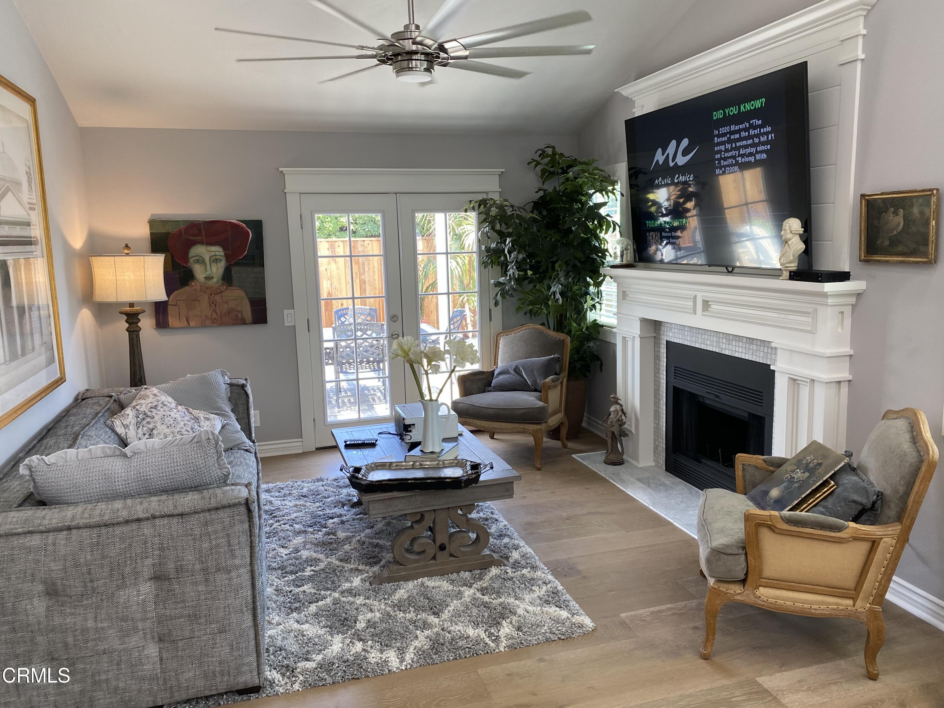 9908 Cheyenne Circle Ventura, CA 93004 - Photo 3 of 19 a living room with furniture and a fireplace