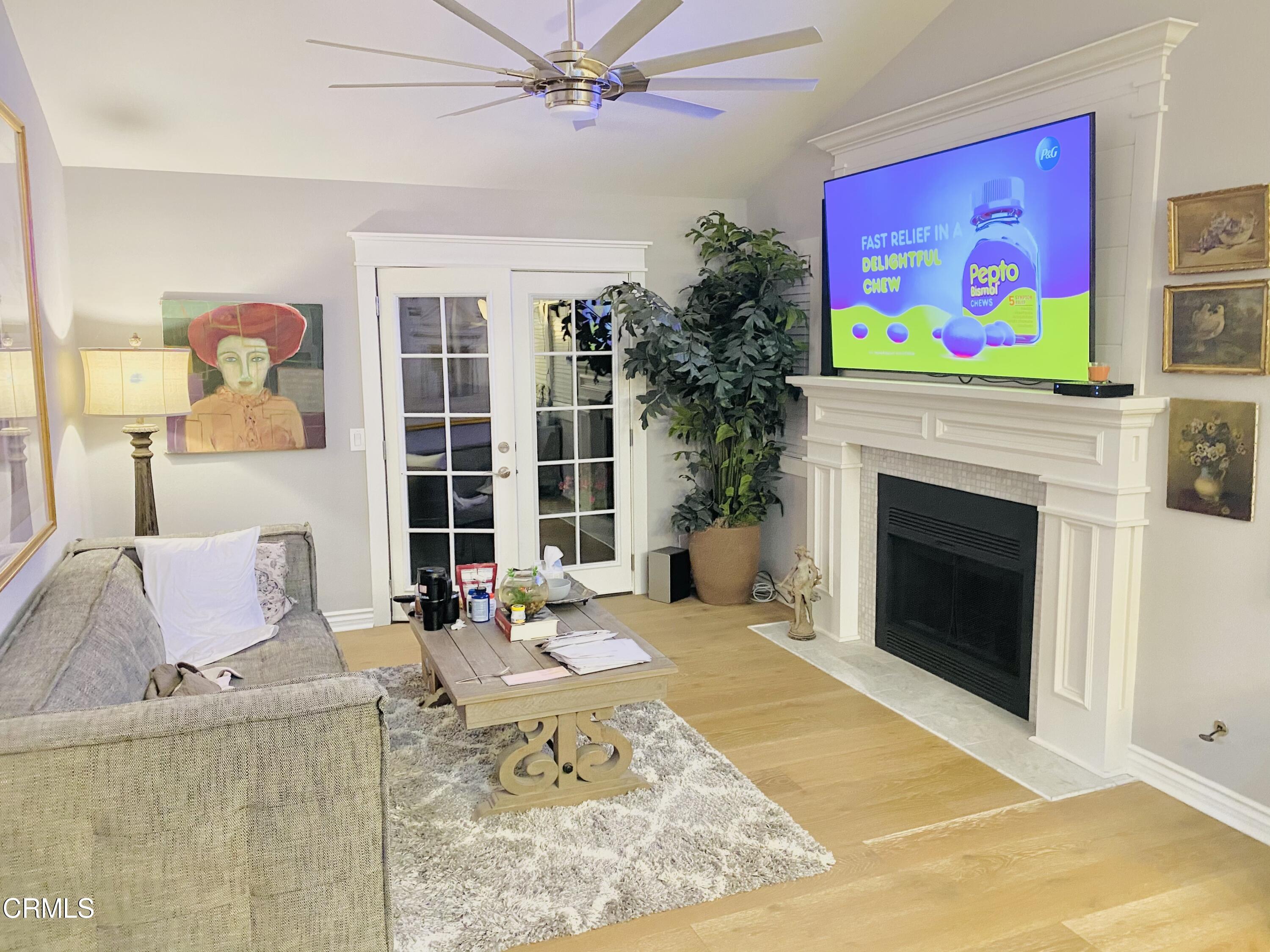 9908 Cheyenne Circle Ventura, CA 93004 - Photo 4 of 19 a living room with furniture and a fireplace