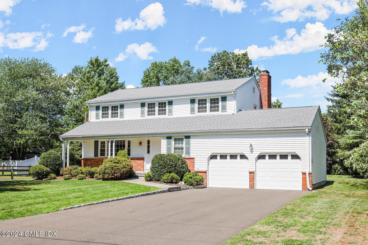 32 Rainbow Drive Riverside, CT 06878 - Photo 1 of 19 a front view of house with yard and green space