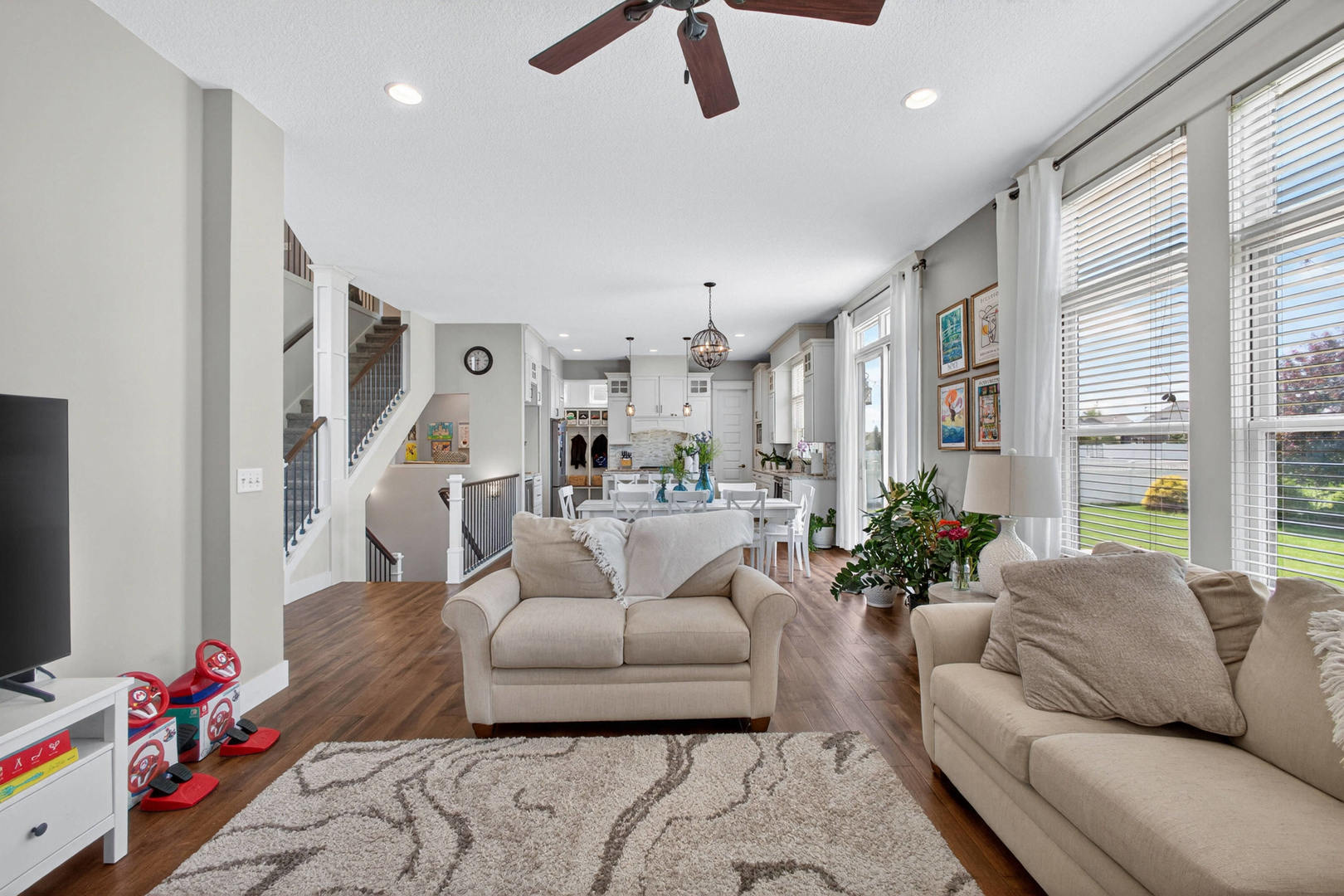 5700 Emily Road Bettendorf, IA 52722 - Photo 9 of 58 a living room with furniture or couch and a potted plant