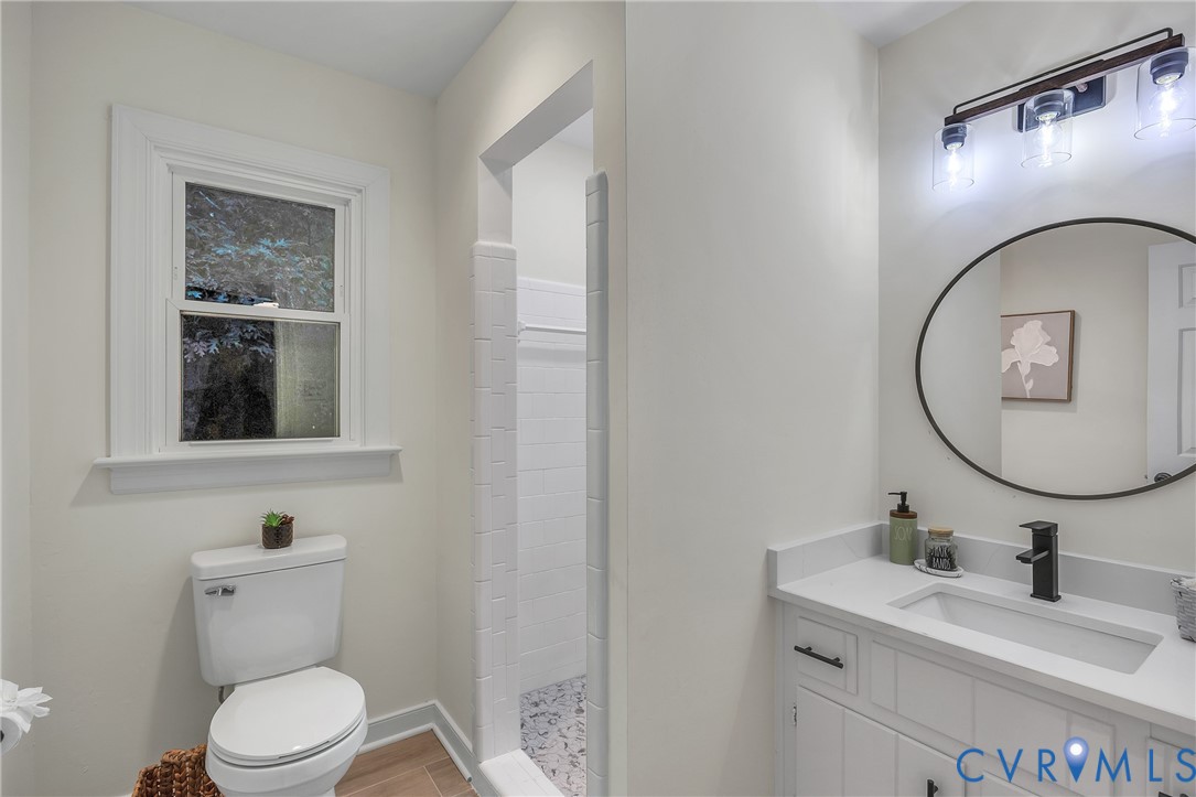 2604 Whispering Oaks Terrace Midlothian, VA 23112 - Photo 20 of 35 Full bathroom featuring vanity and a tile shower
