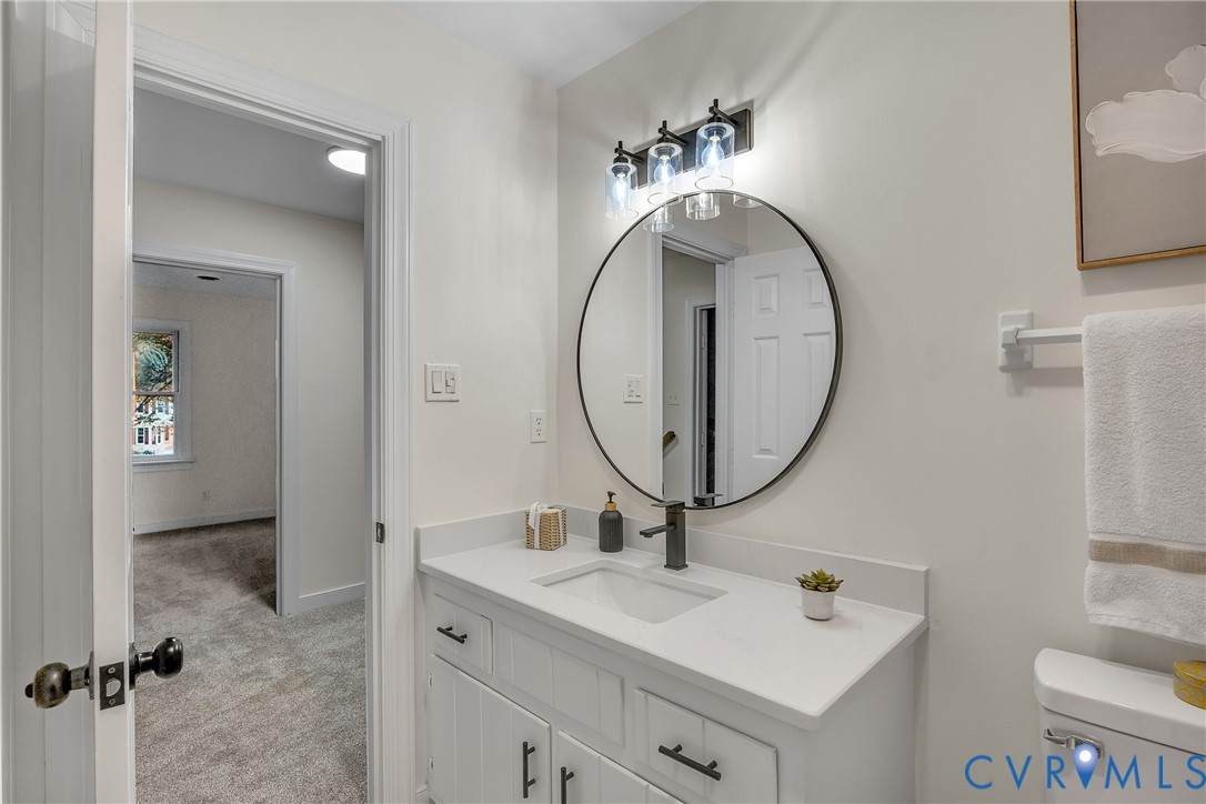 2604 Whispering Oaks Terrace Midlothian, VA 23112 - Photo 25 of 35 Bathroom featuring light colored carpet and vanity