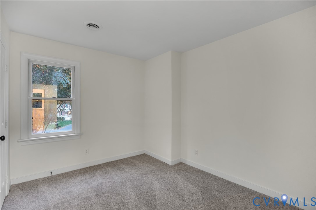 2604 Whispering Oaks Terrace Midlothian, VA 23112 - Photo 27 of 35 Carpeted empty room featuring baseboards