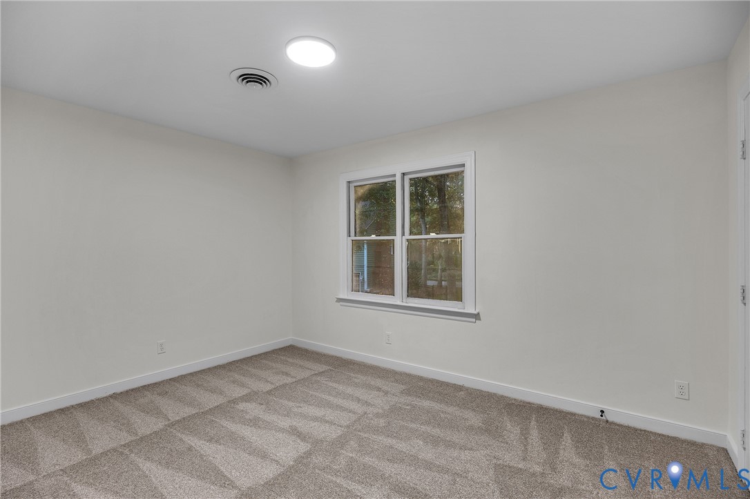 2604 Whispering Oaks Terrace Midlothian, VA 23112 - Photo 30 of 35 Empty room with baseboards and carpet flooring
