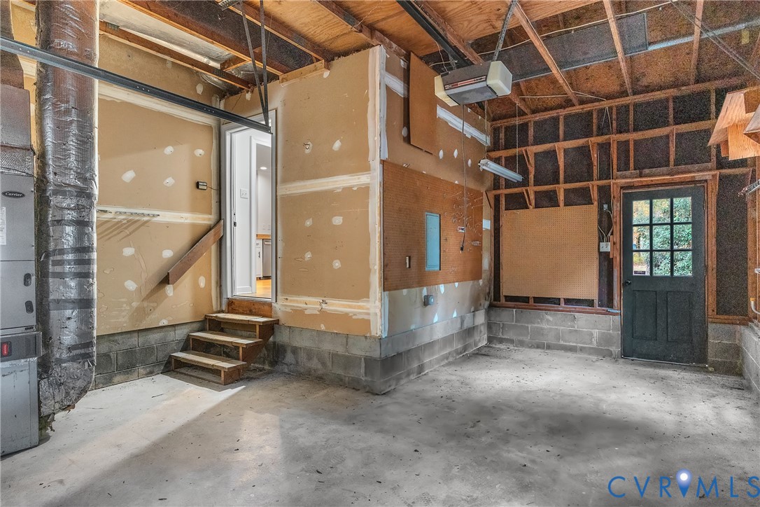 2604 Whispering Oaks Terrace Midlothian, VA 23112 - Photo 34 of 35 Garage with a garage door opener