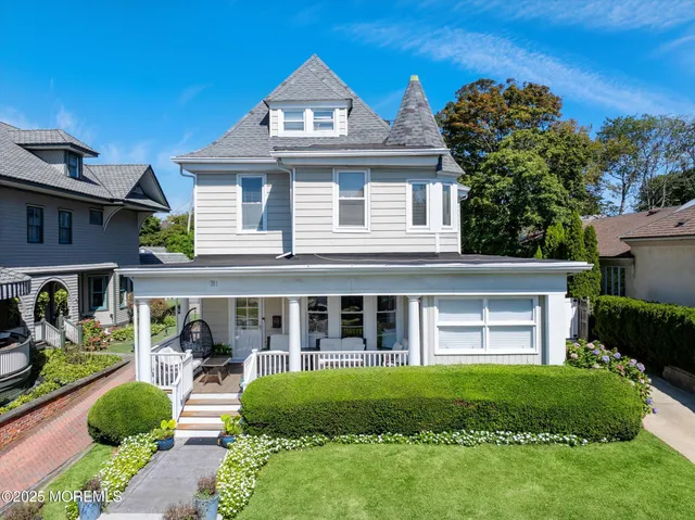 a view of a house with a garden and plants