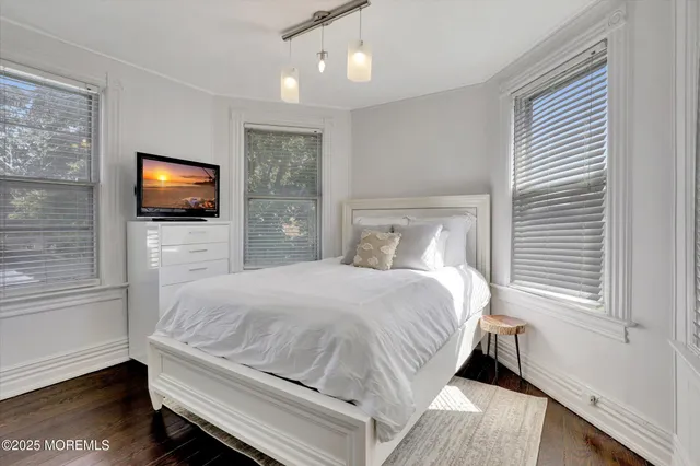 a view of a bathroom with a sink and a mirror