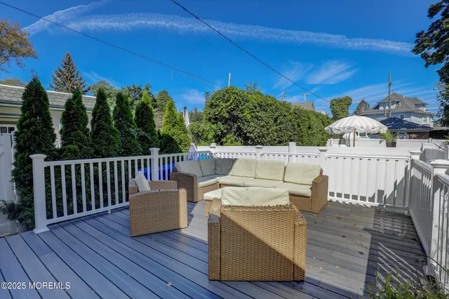 an aerial view of a residential houses with outdoor space