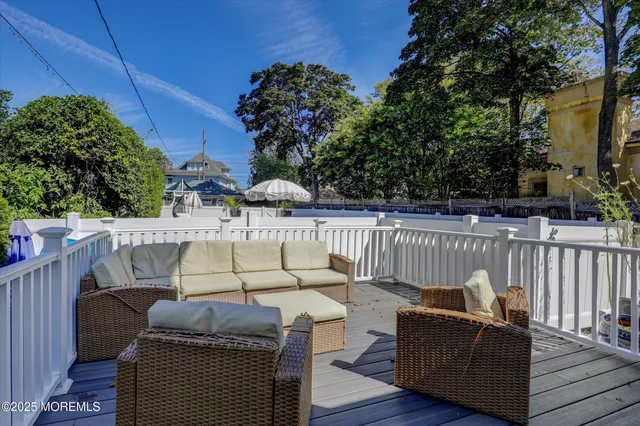 an aerial view of a houses with a city street