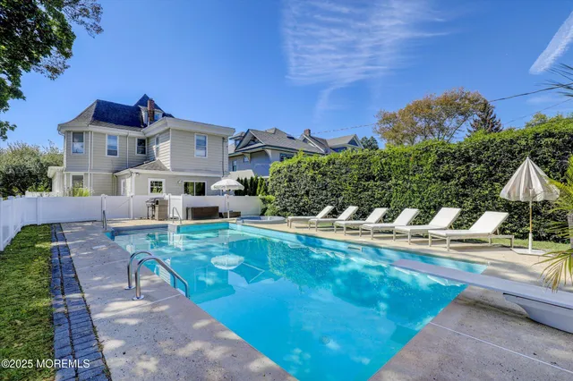a front view of a house with a small yard