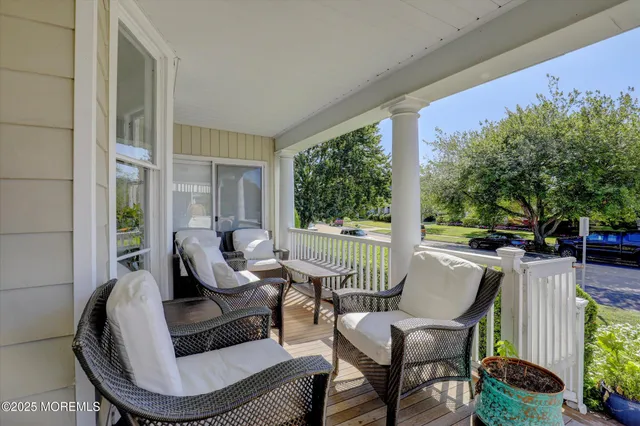 a view of entryway with stairs and wooden floor
