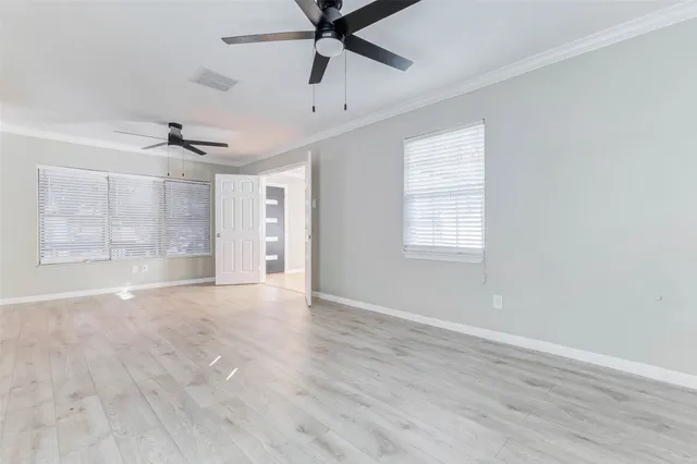 a view of an empty room with a window