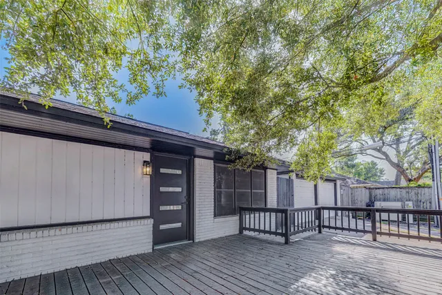 a view of a wooden roof deck