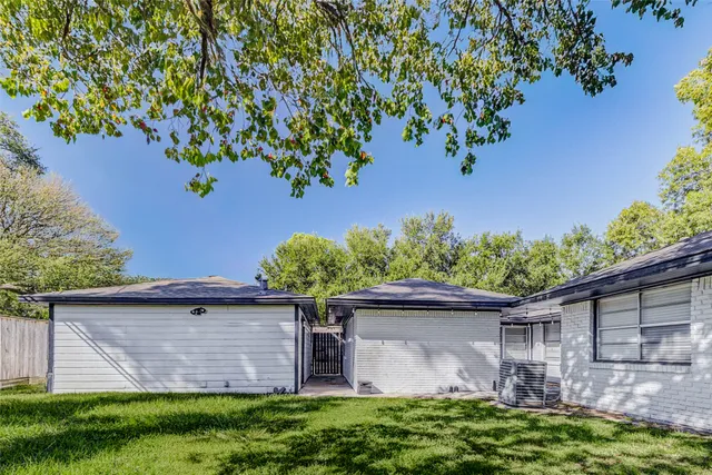 front view of a house with a big yard