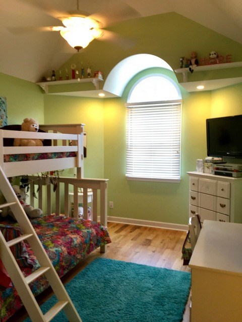 8630 East Hopewell Road Musella, GA 31066 - Photo 18 of 28 a bedroom with furniture and a flat screen tv