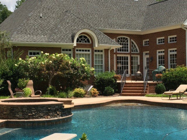 8630 East Hopewell Road Musella, GA 31066 - Photo 22 of 28 a front view of a house with garden